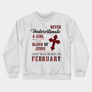 Never Underestimate A Girl Who Is Covered By The Blood Of Jesus And Was Born In February Crewneck Sweatshirt